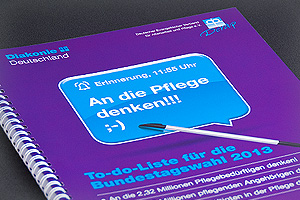 Diakonie Deutschland und DEVAP e. V. – Notizblock & Roll-Up